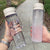 Damen tragbare Wasserflasche mit praktischem Reinigungssystem Karnz