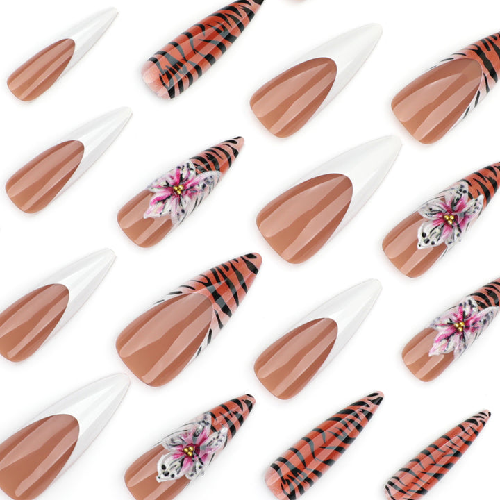 Kunstvolle Stiletto-Nägel mit floralem und tierischem Design Karnz