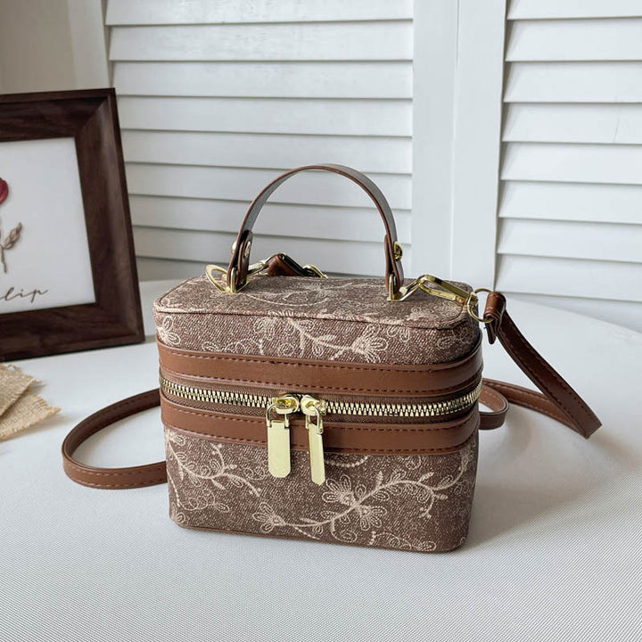 Blumenverzierte Kosmetiktasche