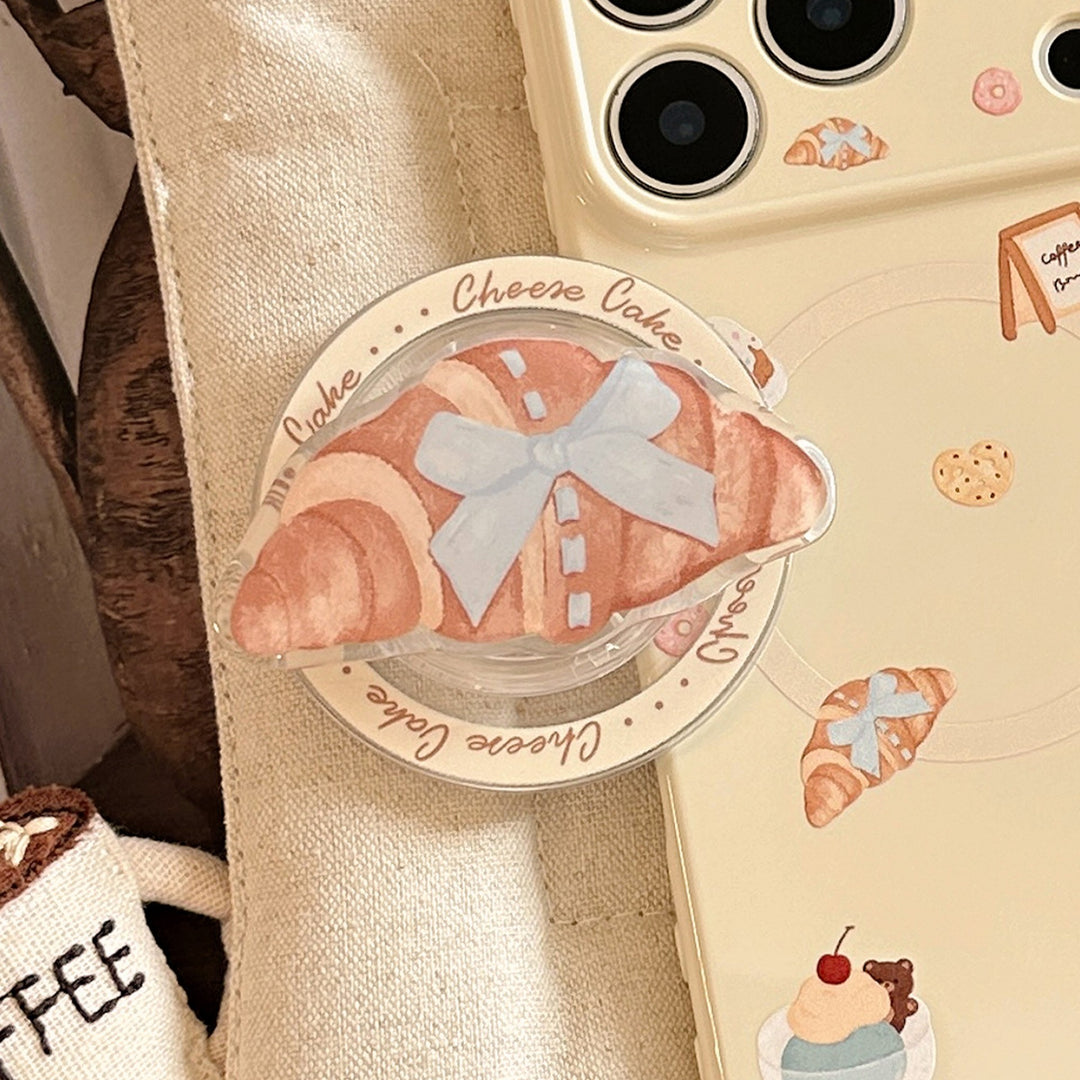 Smartphone Fingerhalter im Croissantdesign Karnz