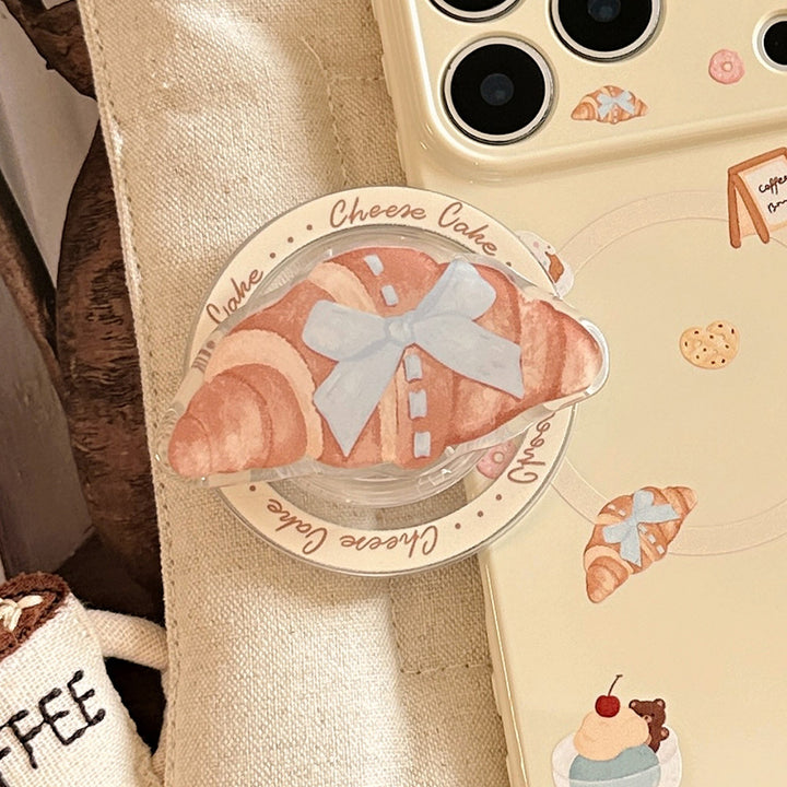Smartphone Fingerhalter im Croissantdesign Karnz