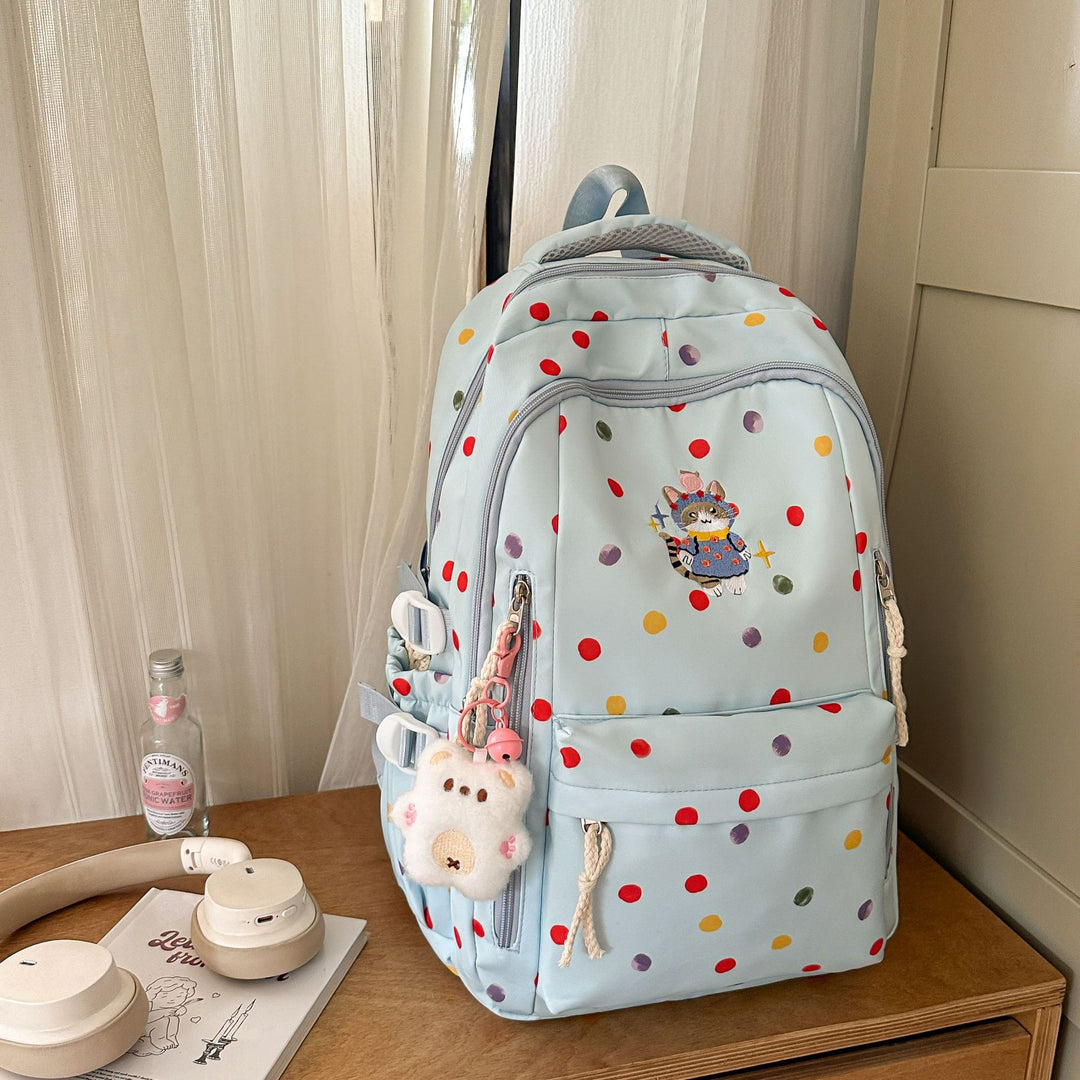 Verspielt gemusterter Schulrucksack