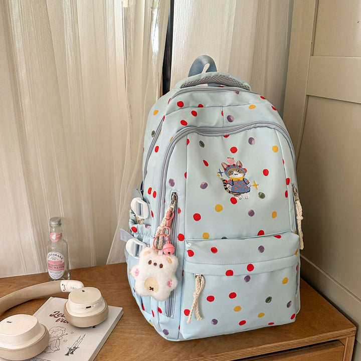 Verspielt gemusterter Schulrucksack