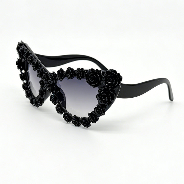 Damen Herzförmige Sonnenbrille mit floraler Applikation Karnz