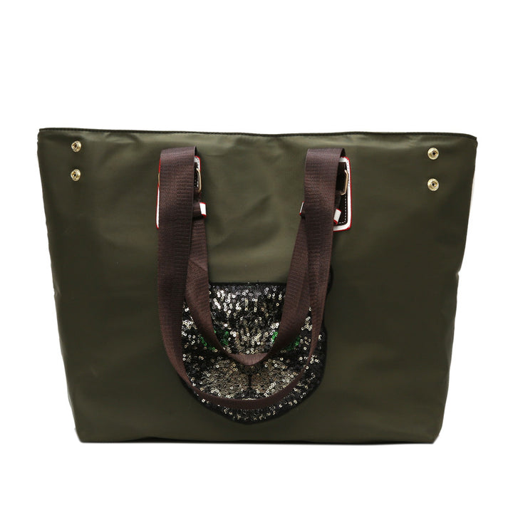 Stylische mit Pailletten dekorierte Tragetasche