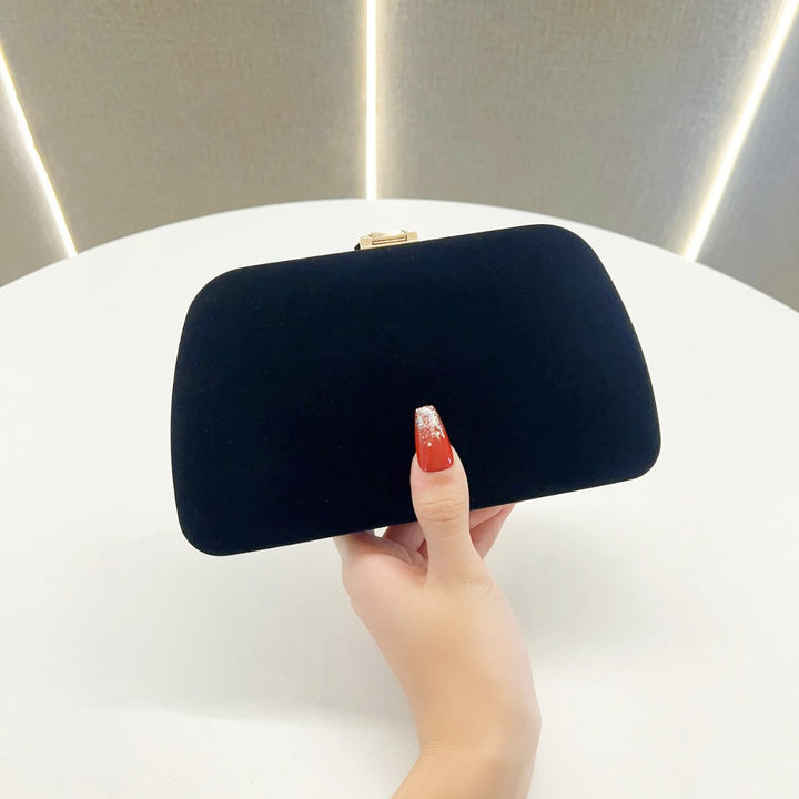 Elegante abendhandtas mit Blattakzenten