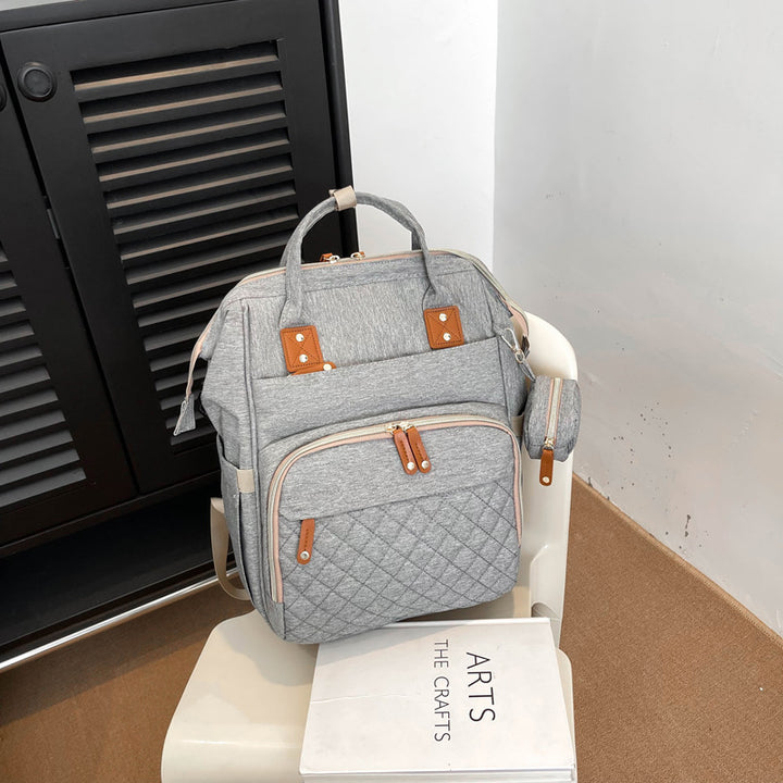 Multi-Taschen Stepp Rucksack Karnz