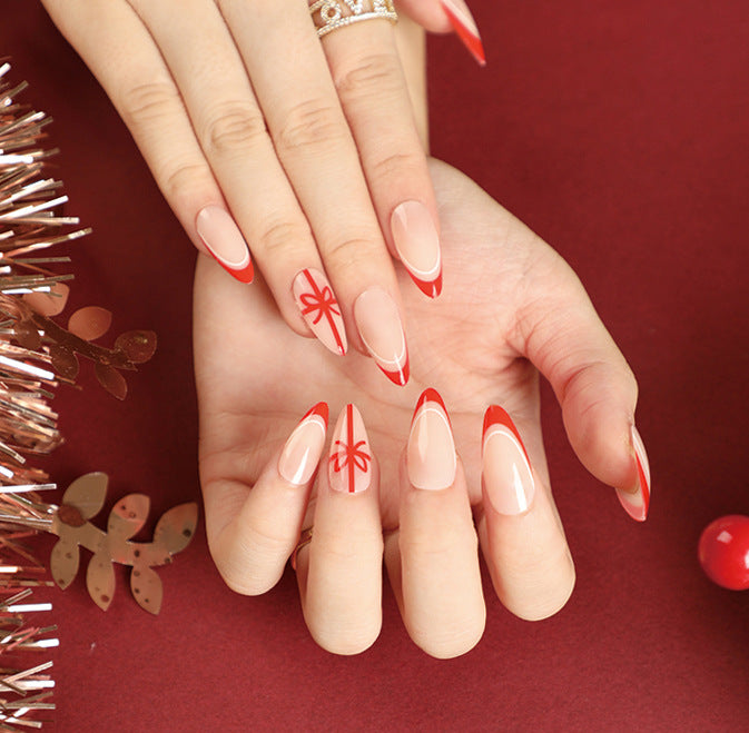 Elegante Acryl-Nägel mit goldenen Akzenten Karnz