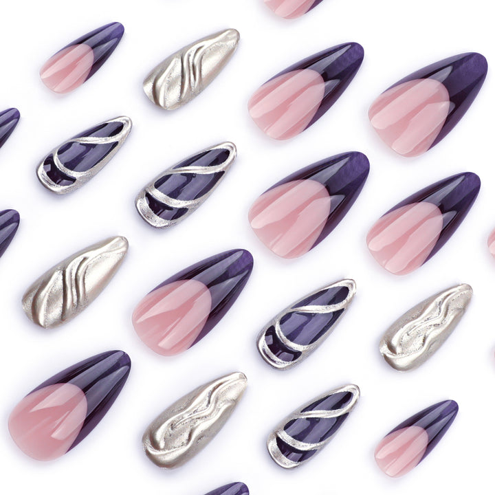 Kunstvolle Stiletto-Nägel mit eleganten Gold- und Ombre-Design Karnz