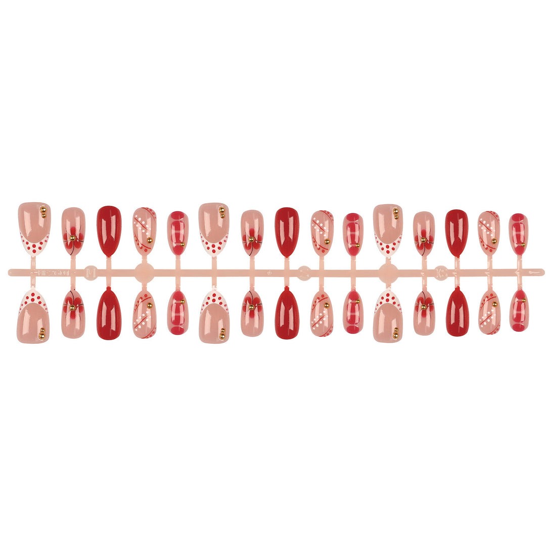 Künstlerisches Press-On Nail Set mit dekorativen Akzenten