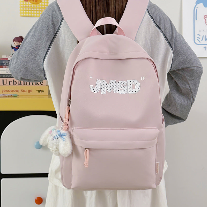 Trendy lässiger Tagesrucksack mit süßem Charakterakzent Karnz