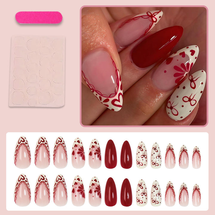 Kunstnagelset mit kreativen Blüten- und Rautenmustern Karnz