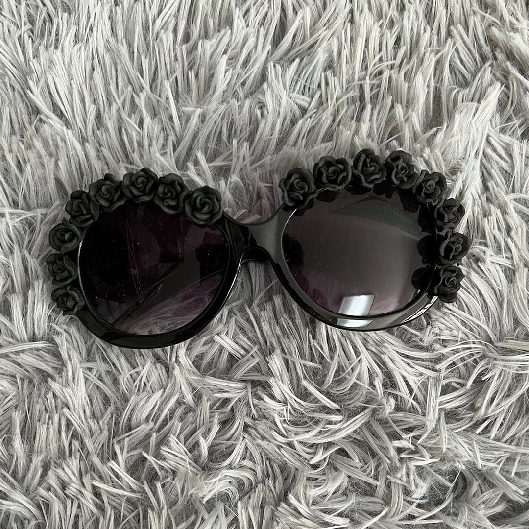 Damen Sonnenbrille mit floralen Akzenten Karnz