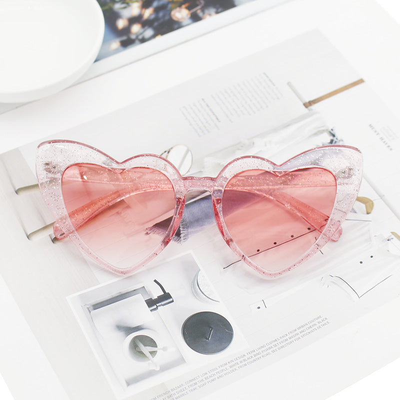 Damen Herzförmige Sonnenbrille mit glitzerndem Rahmen Karnz