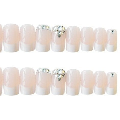 Elegante French Tip Press-On Nagelset mit Rhinstein-Akzenten