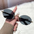 Damen modische und elegante Sonnenbrille mit ovalem Design Karnz