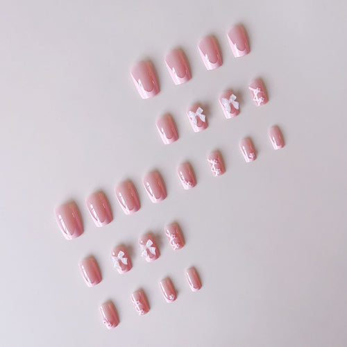 Kunstnagelset mit filigranen 3D-Blüten und Schleifen Karnz