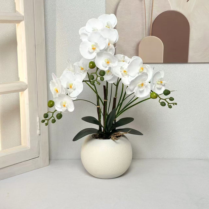 Elegante künstliche Orchideenpflanzenarrangement für die Wohnkultur