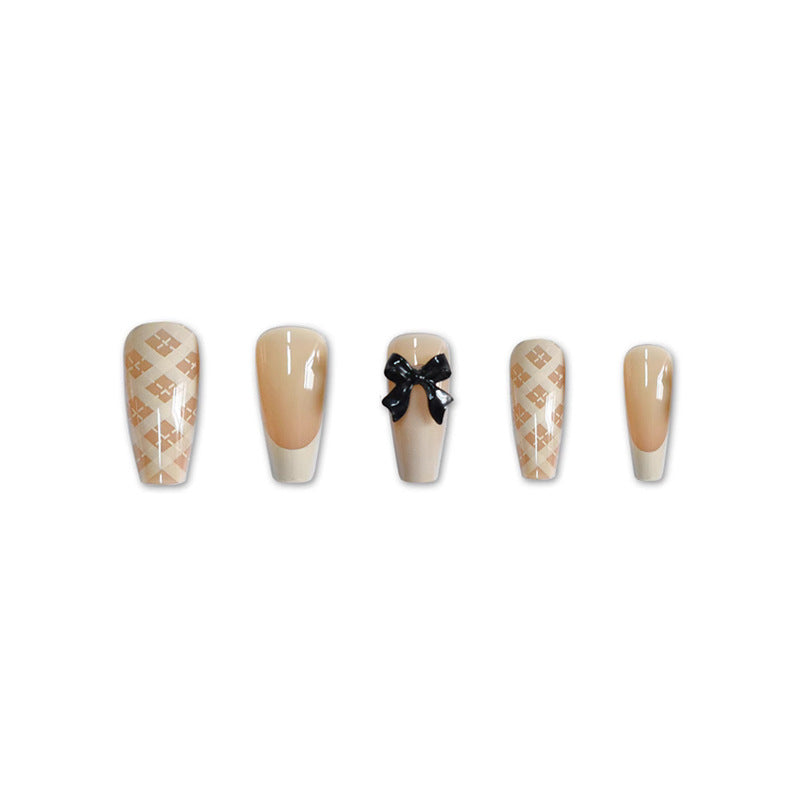Stylisches Press-On Nagelset mit dekorativen 3D-Schleifenakzenten Karnz