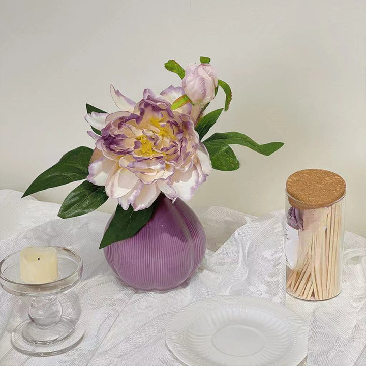 Elegante künstliche Blumenanzeige