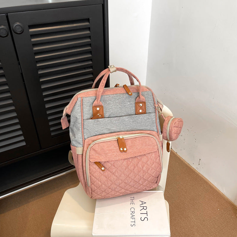 Multi-Taschen Stepp Rucksack Karnz