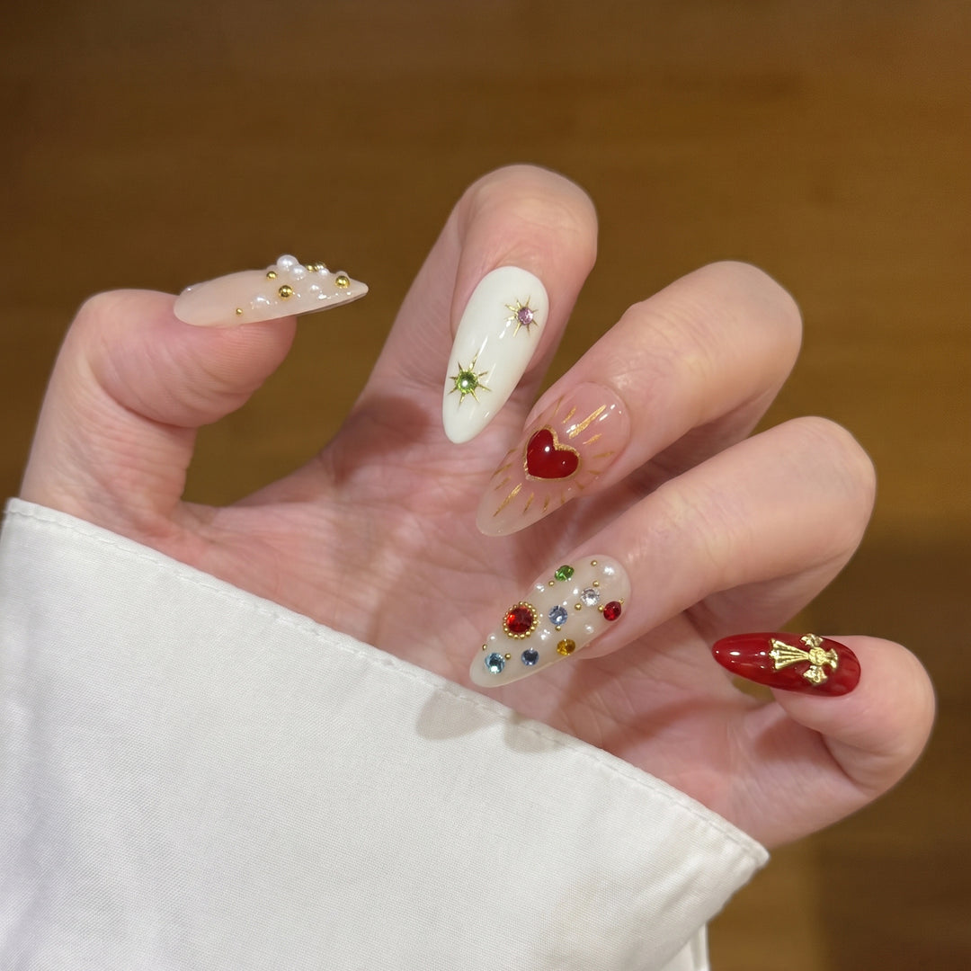 Dekoratives Press-On Nagelkunstset mit mehrfarbigen Edelsteindekoren Karnz