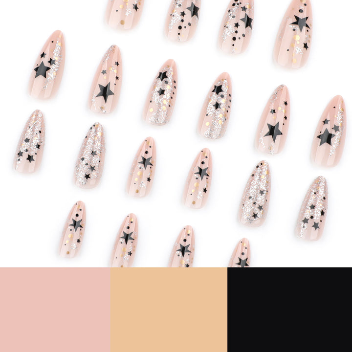 Kunstvolle Stiletto-Nägel mit Glitzer- und Sternenmotiv Karnz