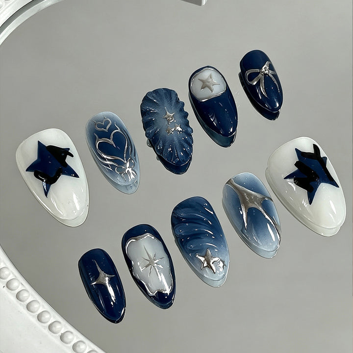 Kunstnagelset mit stilvollen Designs Karnz