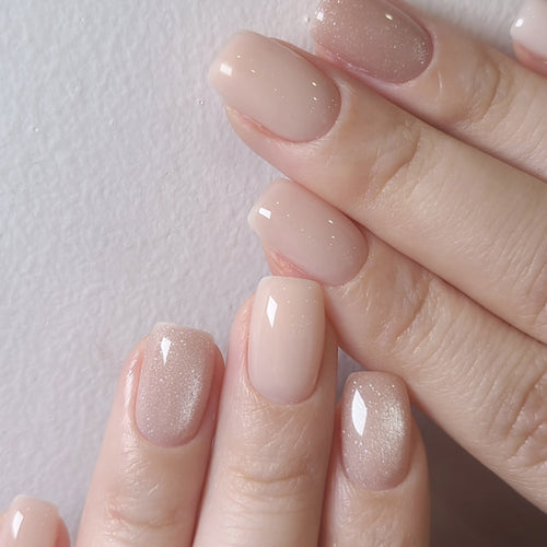 Künstliche Nagelverlängerungen mit elegantem Glitzer-Effekt Karnz