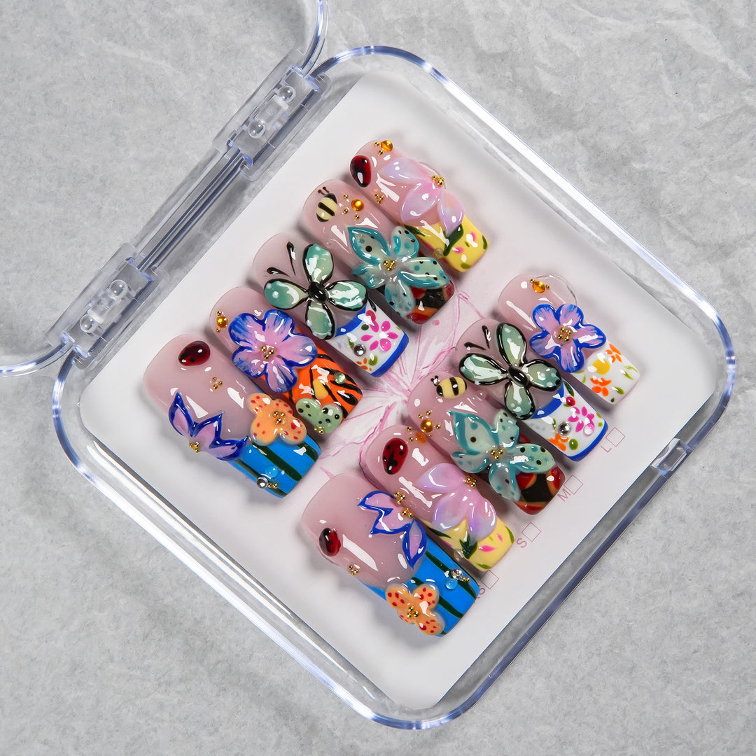 Künstlerisches Press-On-Nagelset mit buntem Design
