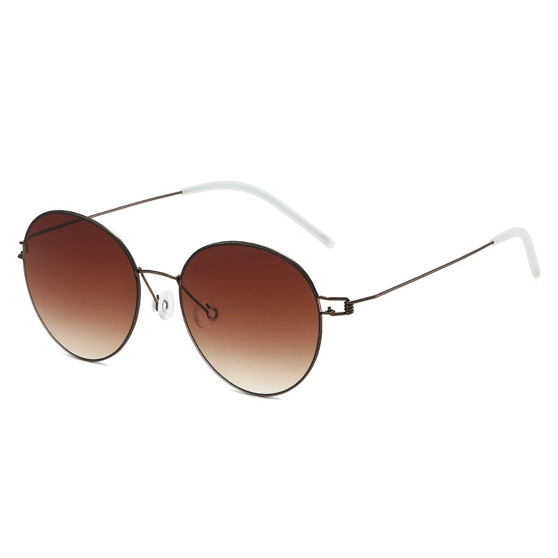 Damen runde Sonnenbrille mit leichtem Metallrahmen und gradienten Gläsern Karnz