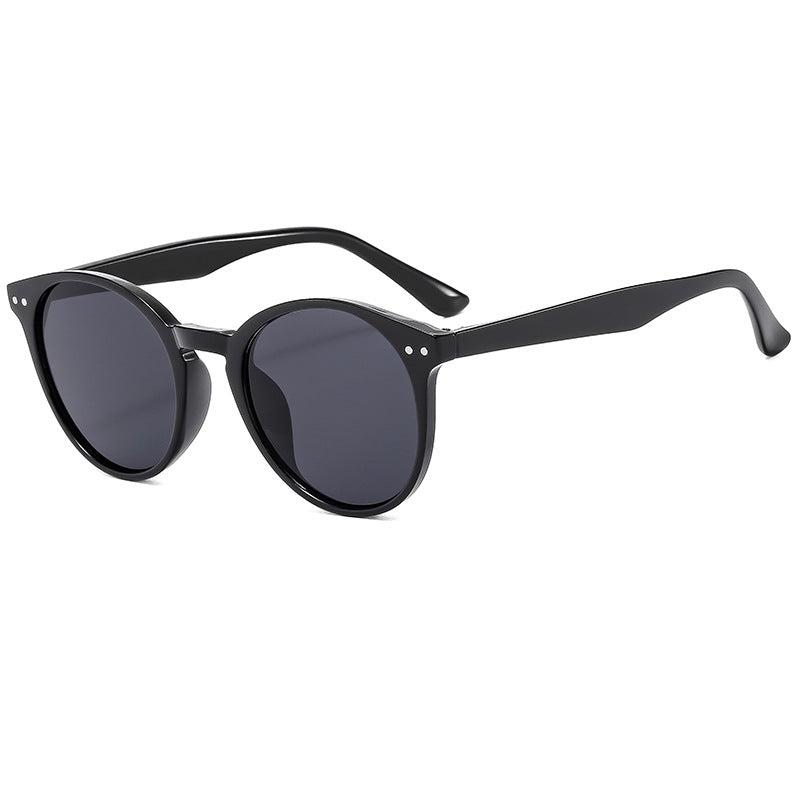 Damen modische runde Sonnenbrille mit transparentem Rahmen und UV-Schutz Karnz