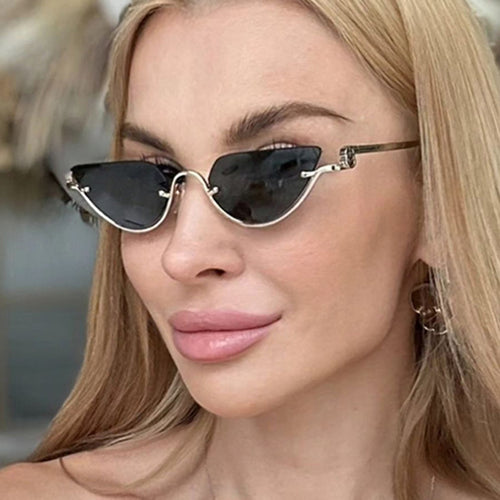 Damen Cat-Eye Sonnenbrille mit goldfarbenem Metallrahmen und UV-Schutz Karnz
