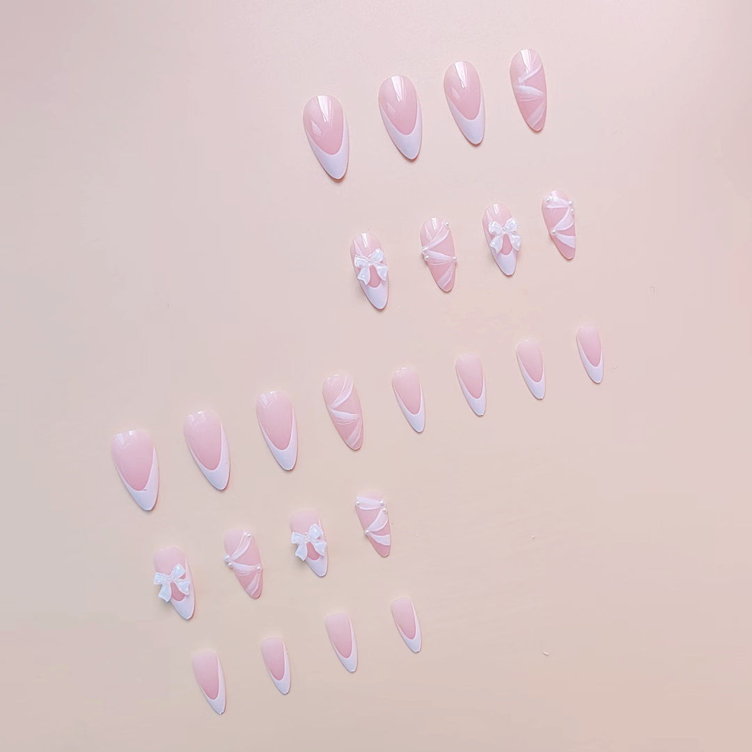 Kunstnagelset mit eleganten 3D-Schleifen und Spitzenverzierungen Karnz