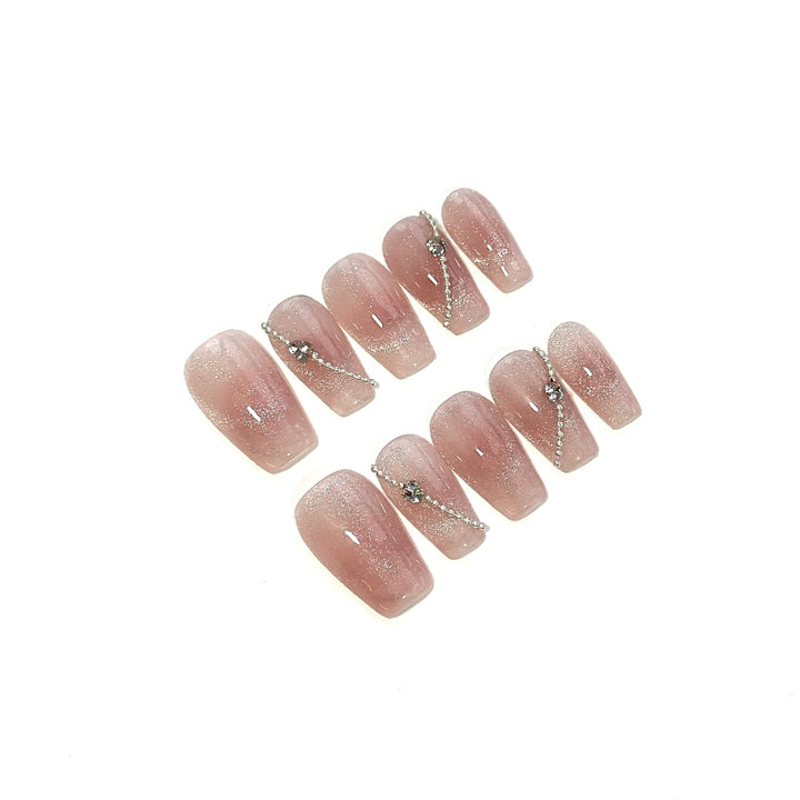 Elegantes dekoratives Press-On-Nagelset mit Strassakzenten
