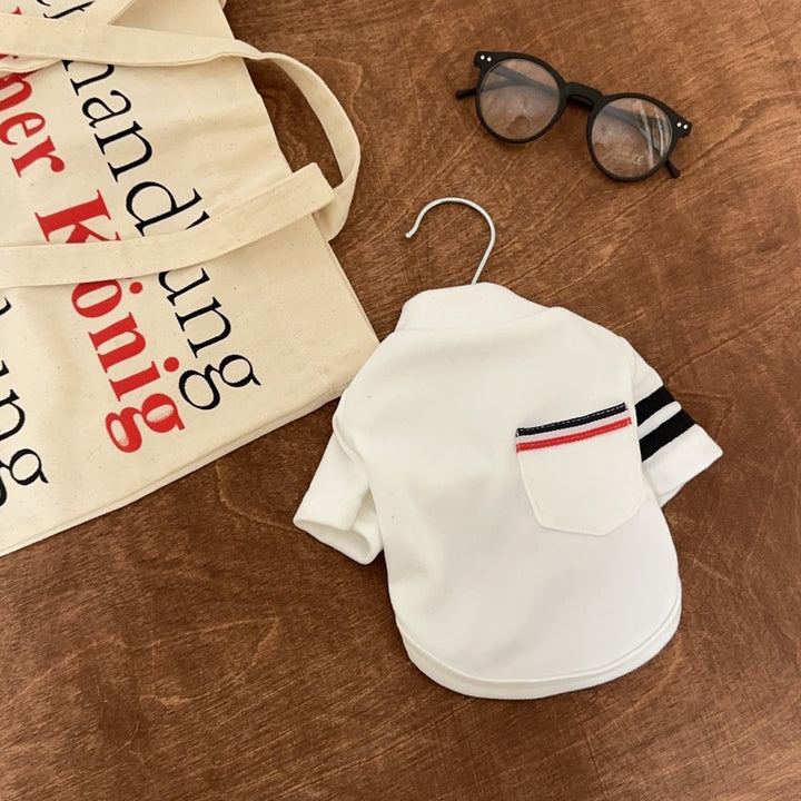Baumwolle Polo Tee mit Brusttasche & gestreiften Ärmeln