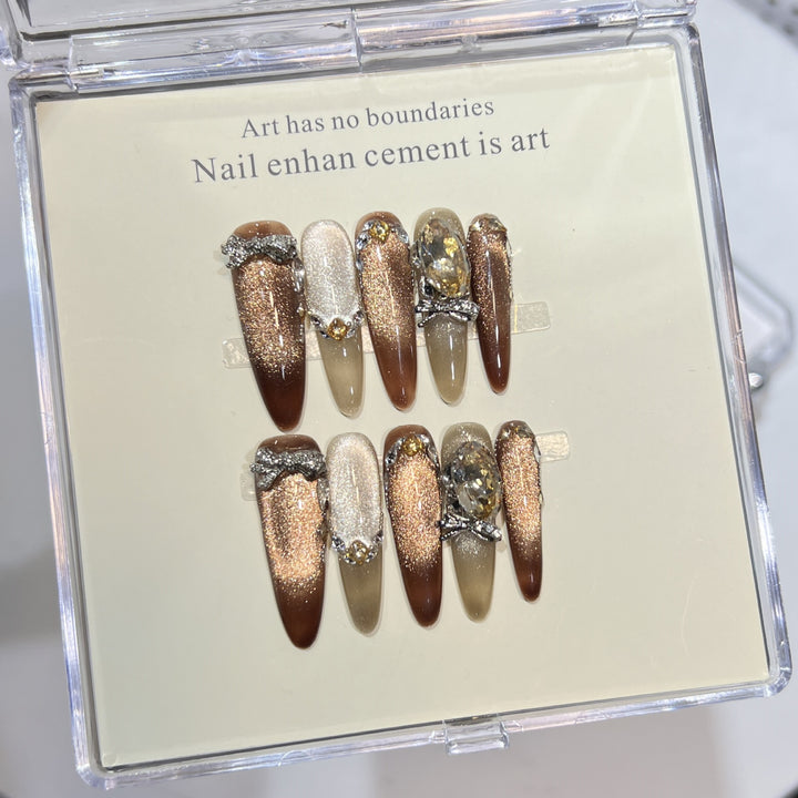 Künstlerisches Stiletto Press-On Nagelset mit Edelsteinakzenten Karnz