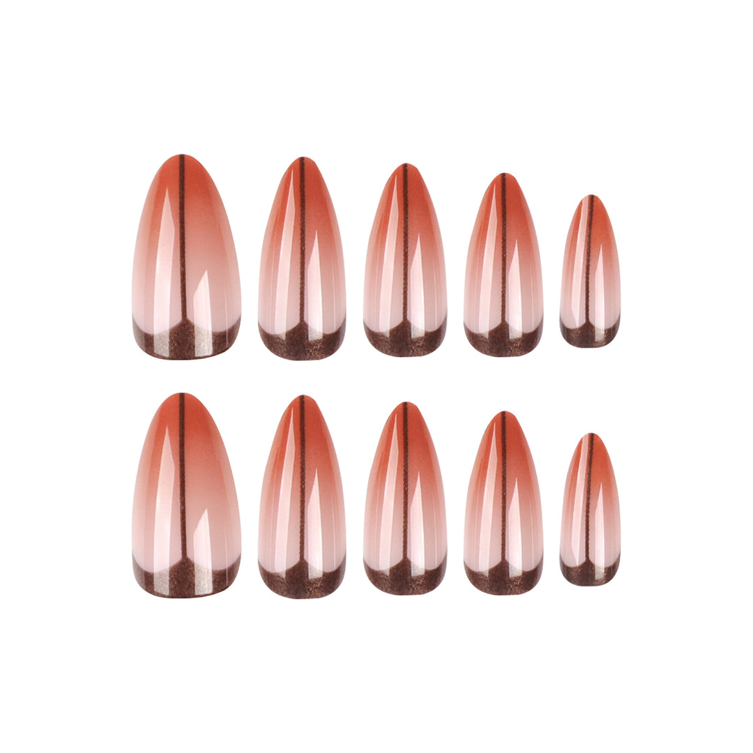 Kunstvolle Stiletto-Nägel mit trendigem Ombre-Effekt Karnz