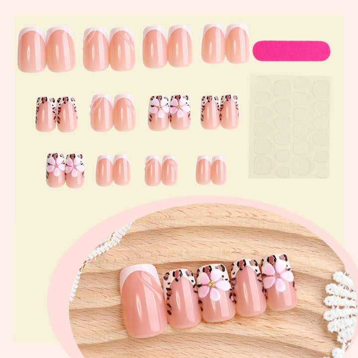 Kunstnagelset mit kreativen floralen und Leopardenmotiven Karnz