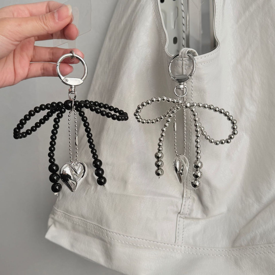 Eleganter Perlencharms-Schlüsselanhänger Karnz