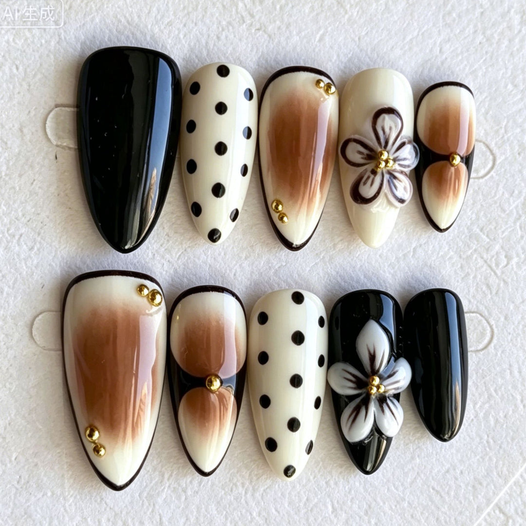 Künstlerisches Press-On Nagelkunstset mit floralen und Pünktchen-Designs Karnz