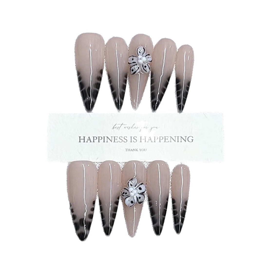Elegante Stiletto Press-On Nagelset mit floralem Design Karnz