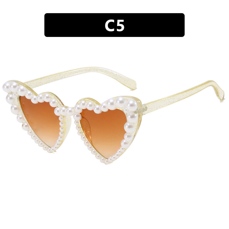 Damen Herzförmige Sonnenbrille mit perlverziertem Rahmen Karnz