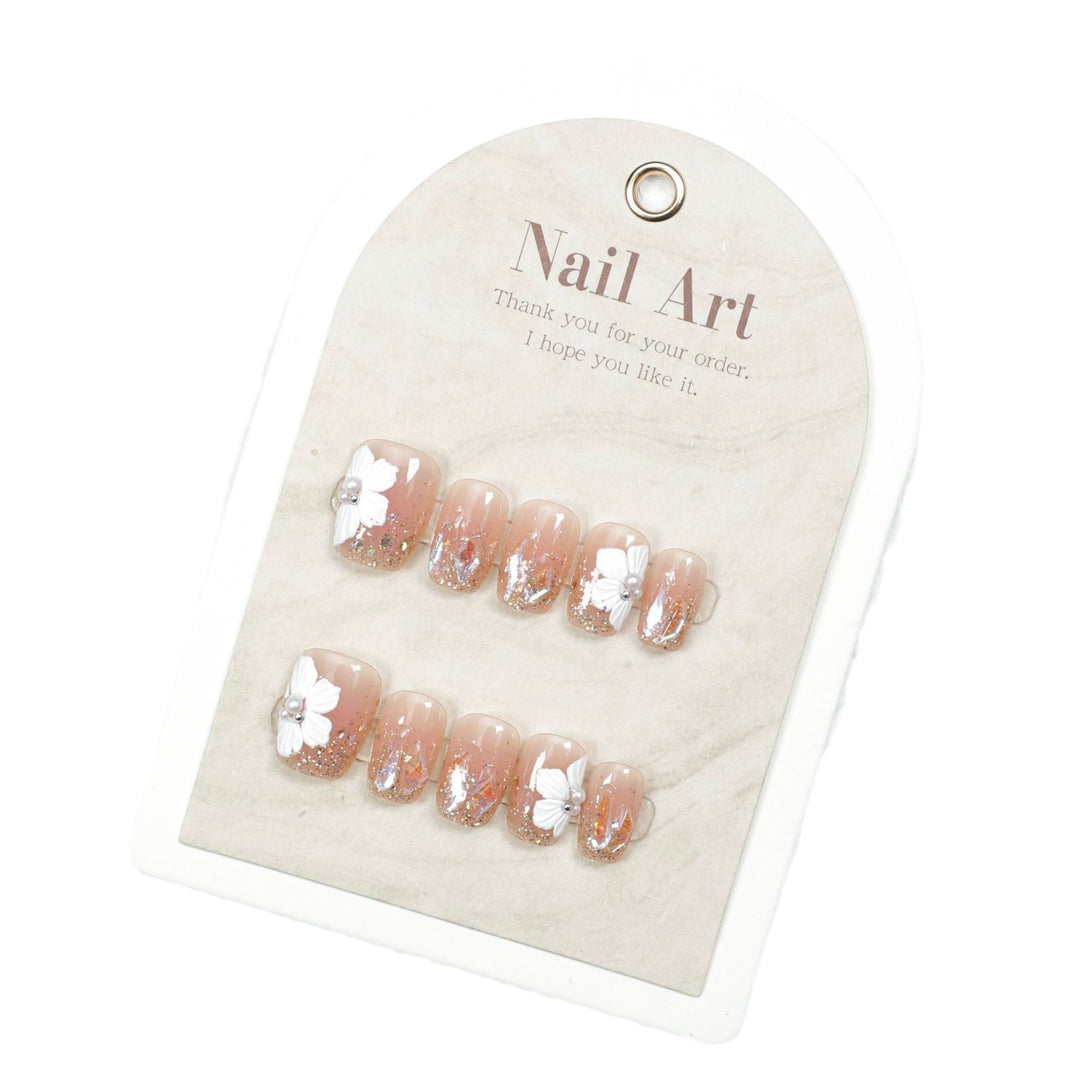 Künstlerisch florales, verziertes Press-On Nageldesign Karnz