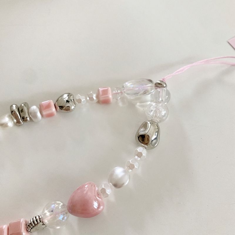 Charmantes Perlenhalsband Karnz