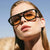 Damen modische quadratische Sonnenbrille aus transparentem Kunststoff Karnz