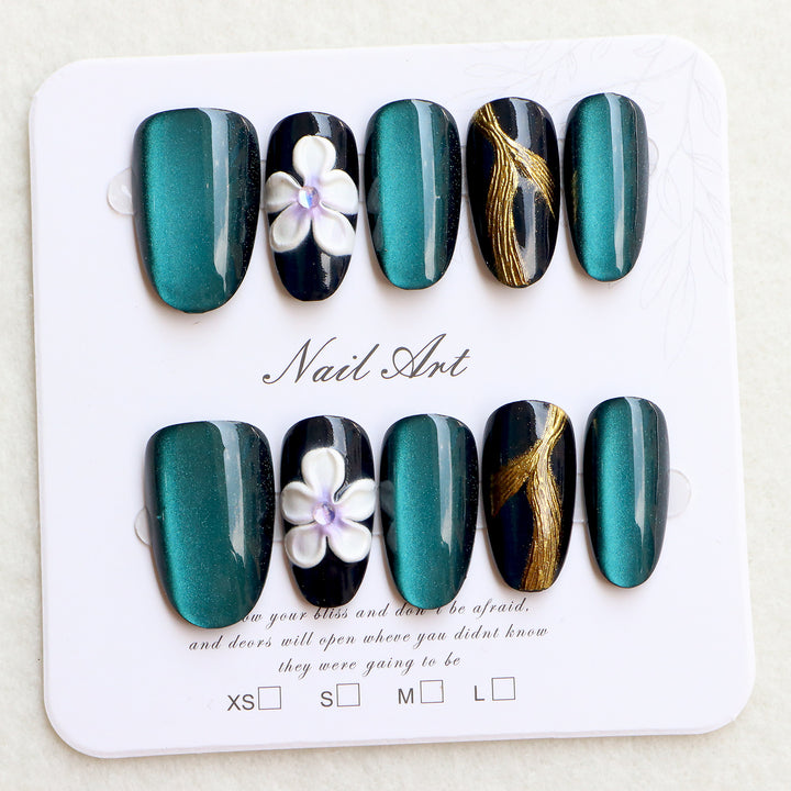 Elegante Press-On Nagelset mit floralen Verzierungen Karnz
