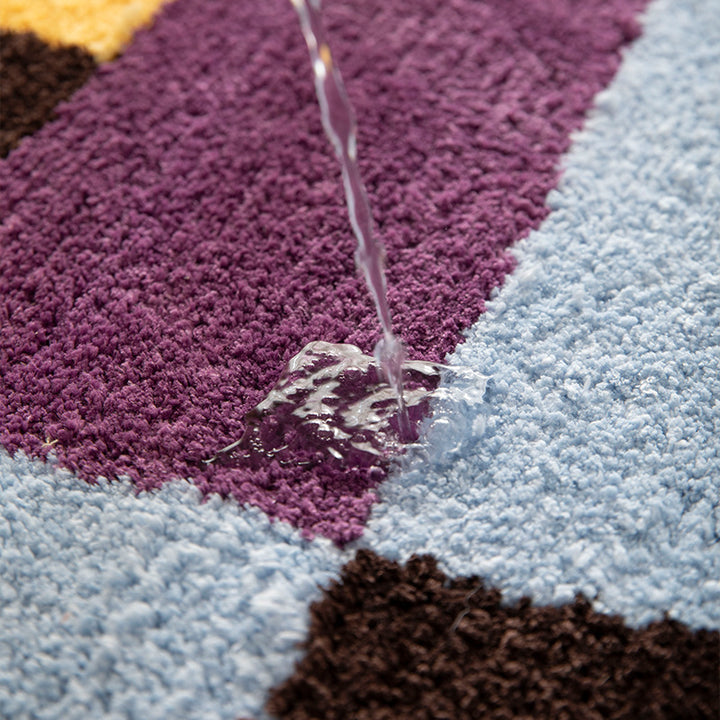 Hochflor-Badematte mit geometrischem Farbblock-Design und rutschfester Unterseite