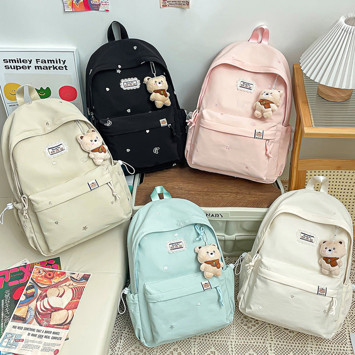 Stylischer backpack mit floralem Schmuck Karnz