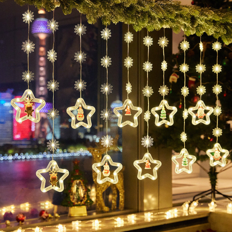 Weihnachtsdekorative Lichtsterne mit Schneeflocken Karnz